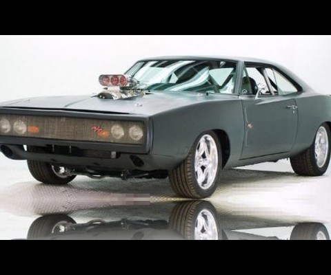 The Dodge Charger driven by Vin Diesel’s character Dom Toretto in the 2009 Fast and Furious movie is now up for grabs at the Volo Auto Museum in Illinois. The matte gray 1970 Dodge Charger RT muscle car flaunts some nice custom additions, including a sports steering wheel, stripped and customized interior and massive bonnet scoop. The dealer’s site doesn’t have many details about the movie car except for the fact that it’s an automatic V8. While the appraised value sits at a hefty US $200,000, they are selling it for low price of US $129,998. The price tag still sounds hefty, but then, we are talking about movie cars.

Read more: http://www.bornrich.org/entry/dodge-charger-rt-from-2009-fast-furious-movie-up-for-grabs/#ixzz129yRT4mV