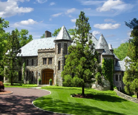 Park-like tranquility sets the stage for this majestic Old World stone manor amidst 12+ acres of rolling countryside. Painstakingly renovated by a noted designer, this richly detailed residence exudes warm magnificence with 8 fireplaces, marquetry floors, sumptuous marble and elegant chandeliers.