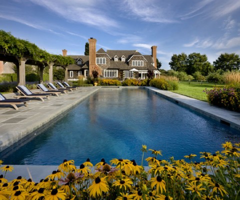 Created by master builder Michael Davis for his personal residence, the 5700 +/- square foot country home brings an English manor elegance to a scenic Sagaponack farm field setting on 2.3 +/- luxuriant landscaped acres with pool and carriage house