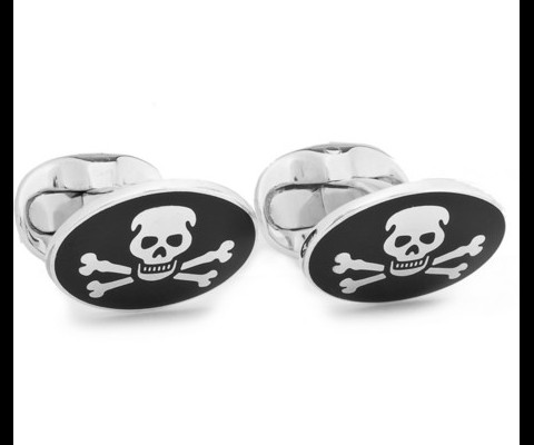 Sterling silver cufflinks from Ralph Lauren Purple Label with oval studs, enamel inserts and a skull and crossbones pattern. Sleek and stylish, these cufflinks add a playful twist to formal outfits.