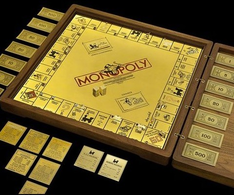 And here you thought that you had game with your gold leaf Monopoly set, ha!  Check out the most dazzling Monopoly game set in the world, the Solid 18K Gold and Diamond encrusted version worth around $2 million.