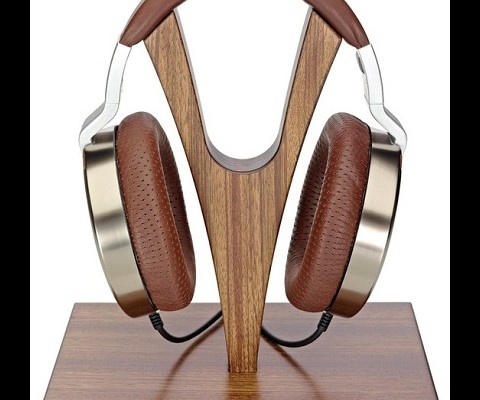 Ultrasone has unveiled its spectacular Edition 10 headphones which are covered in gold and priced at $2,750.
The headphones feature Zebrano wood ear cup inlays, Ethiopian sheepskin leather ear cup pads, Titanium plated drivers and Kevlar coated cables.