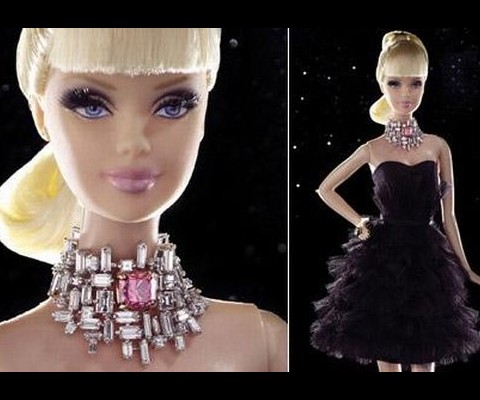 The custom-made doll wears three carats of white diamonds set around a one-carat, square emerald-cut pink diamond. Stefano Canturi has also done the doll’s black strapless party dress, peep-toe stilettos and tumbling blonde hair.